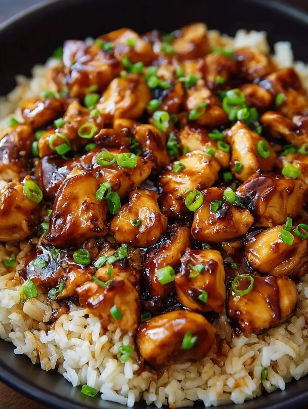 A plate of food with chicken and rice.
