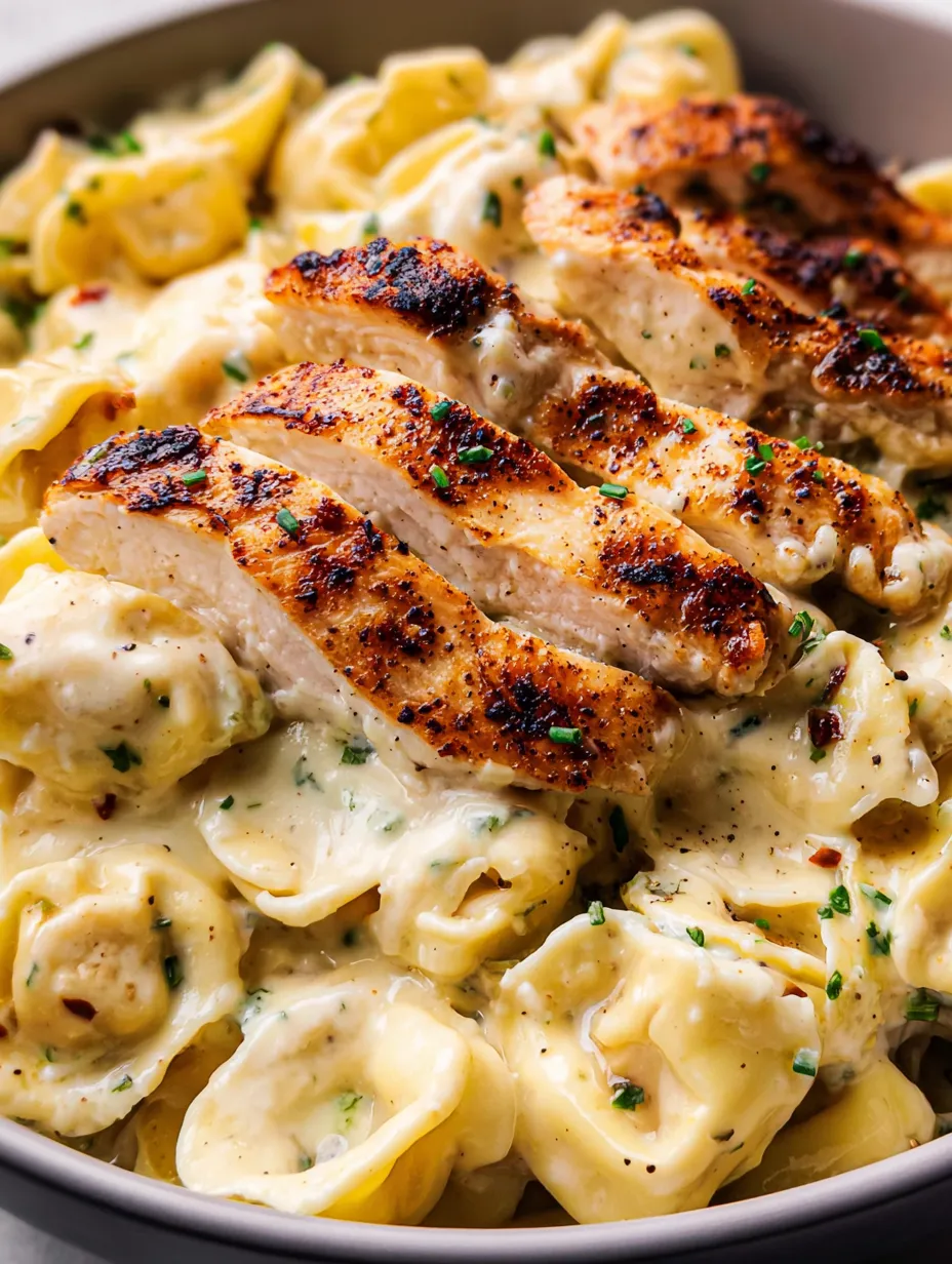 A plate of food with chicken and noodles.