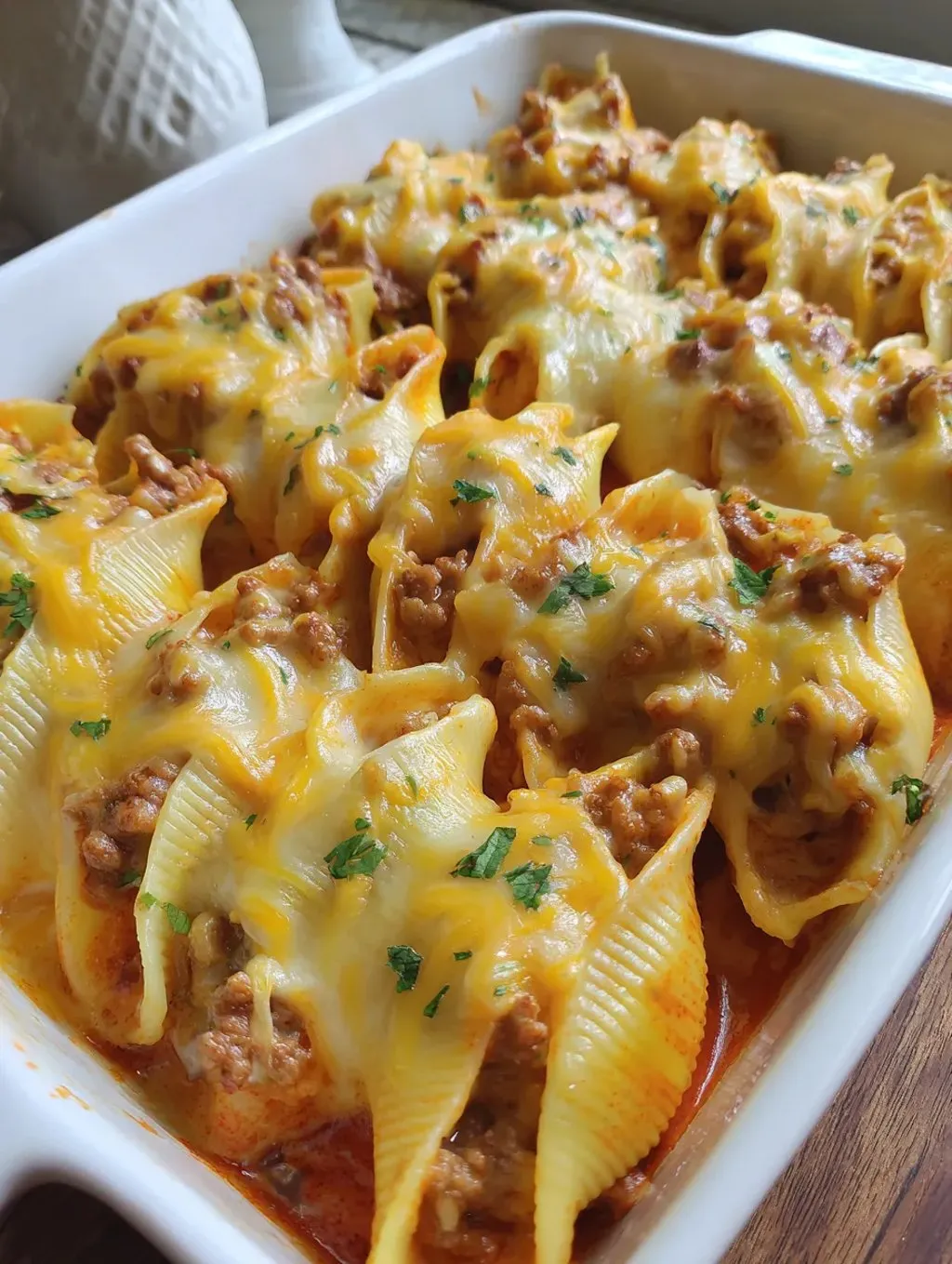A white bowl filled with food.