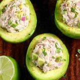 Three avocado halves filled with a creamy salad.