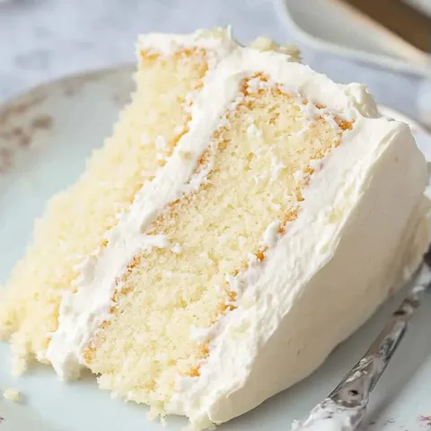 A slice of cake on a plate.