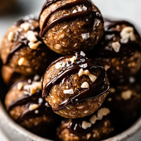 Chocolate covered balls with nuts.