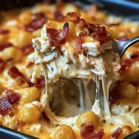 A fork is in a bowl of food.
