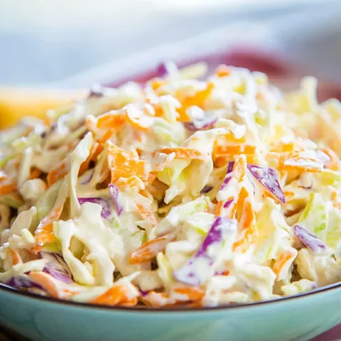 A bowl of coleslaw.