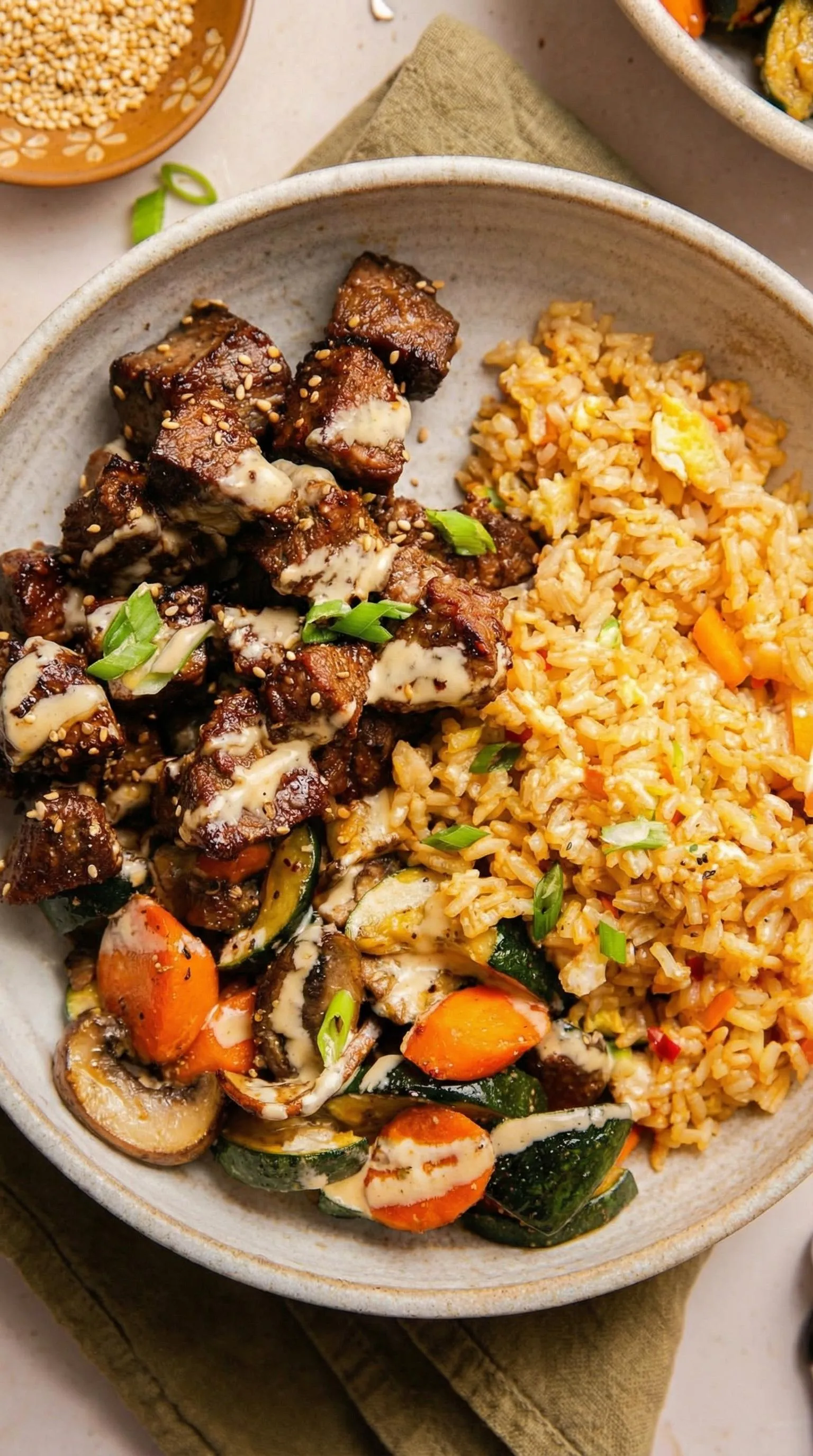 A plate of food with rice and meat.