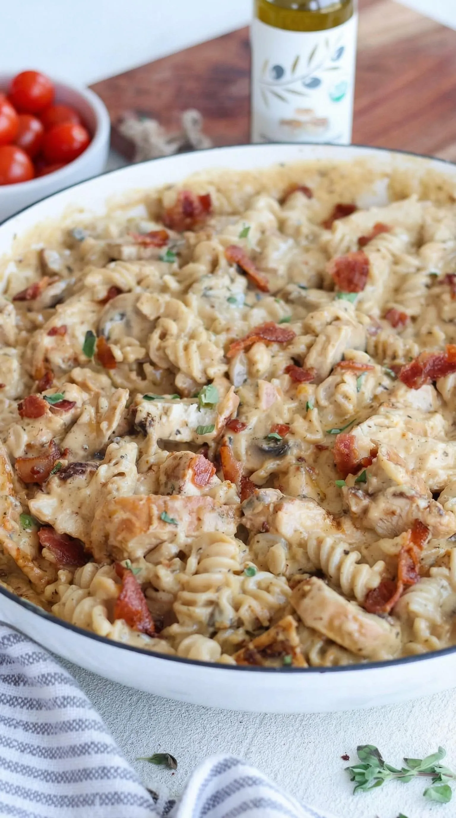 A plate of food with bacon and mushrooms.