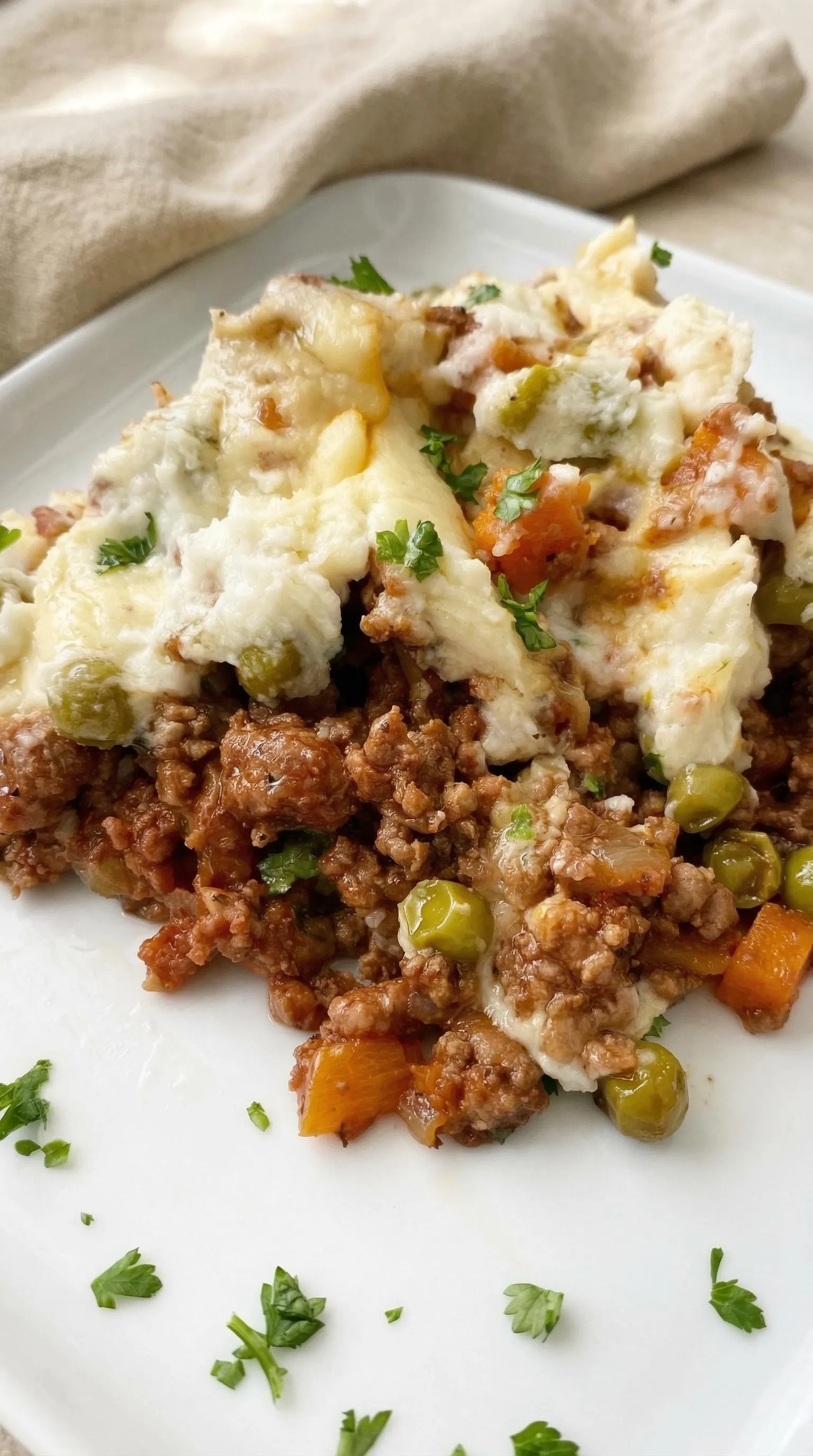 A plate of food with meat and vegetables.