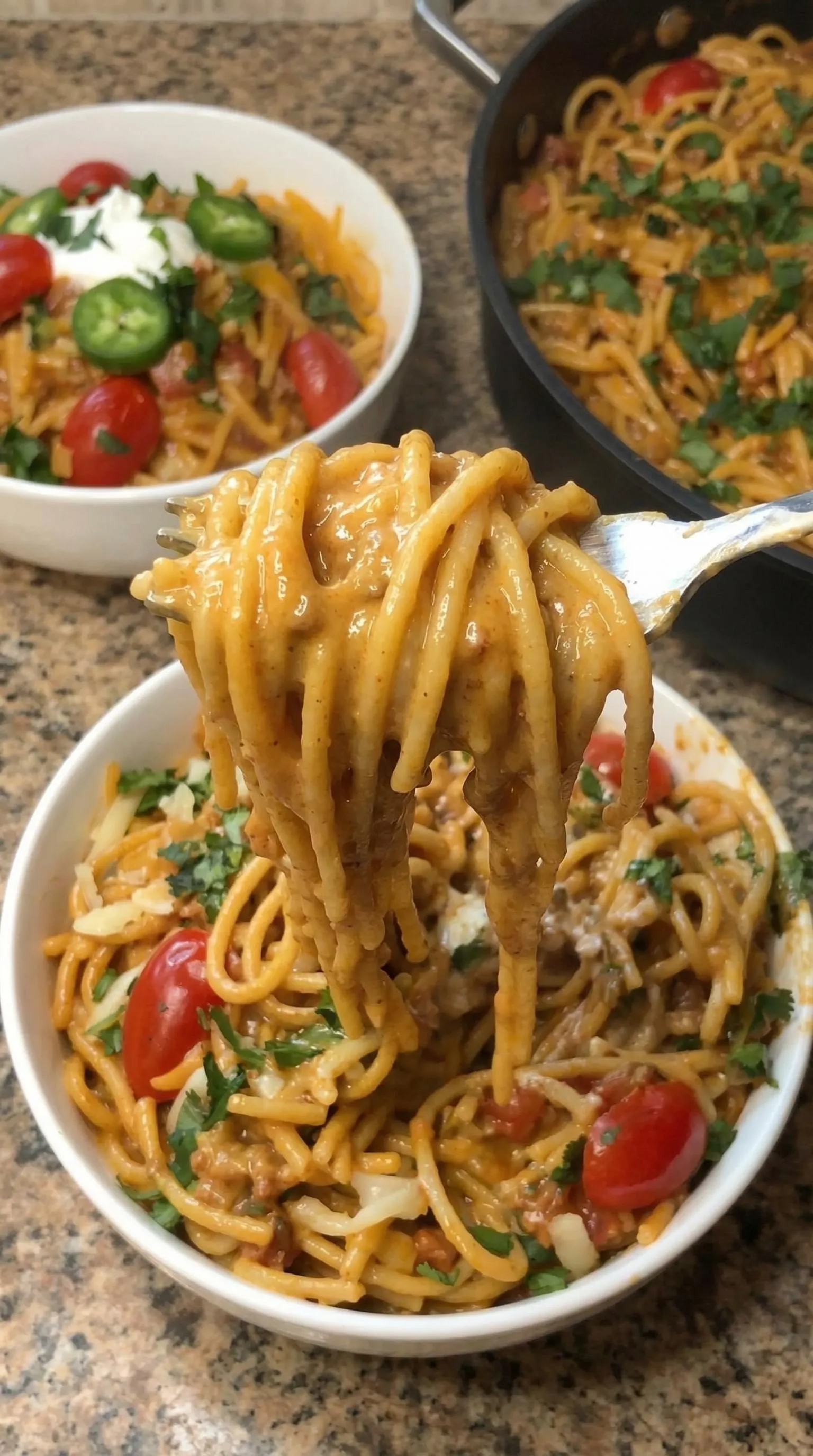 A fork in a bowl of spaghetti.