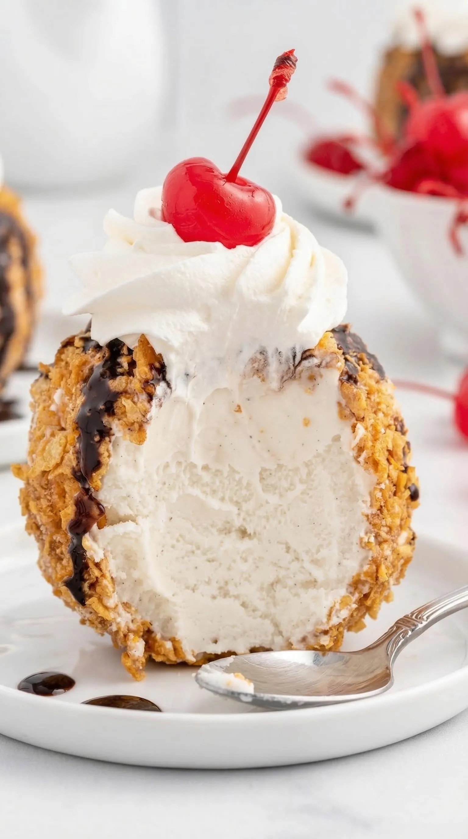 A dessert with a chocolate sauce and whipped cream.