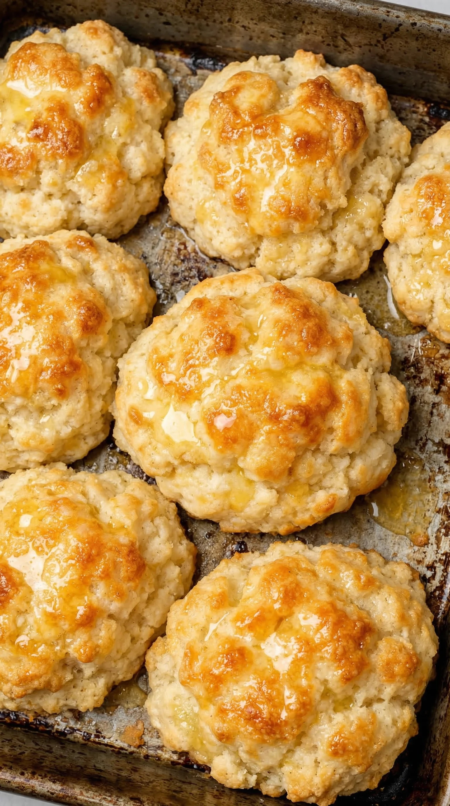 A tray of biscuits with butter.