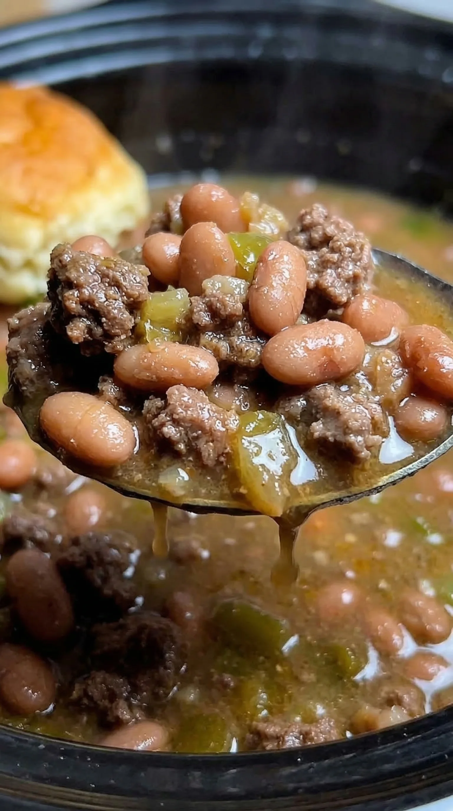 A spoonful of beans and meat.