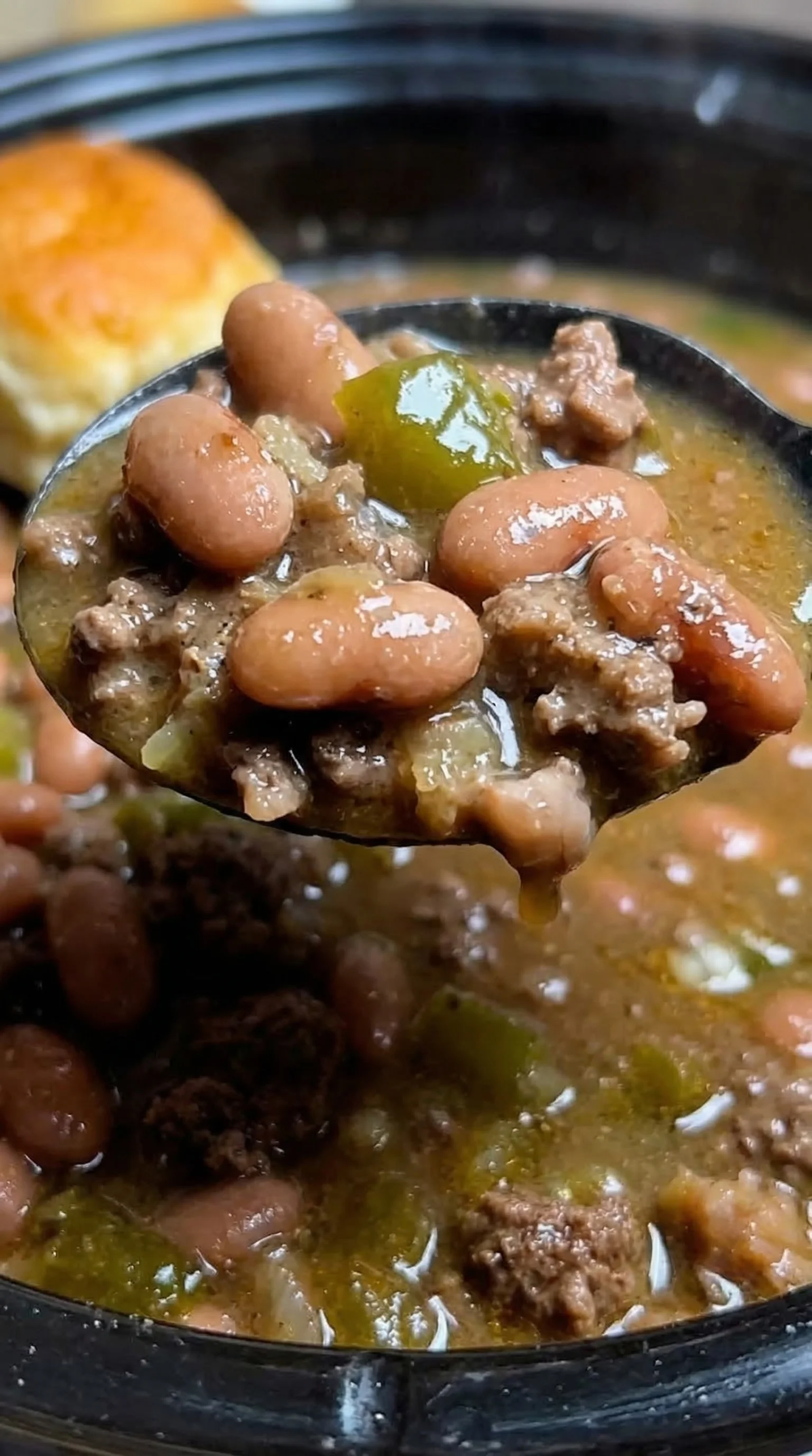 A spoonful of beans and meat.
