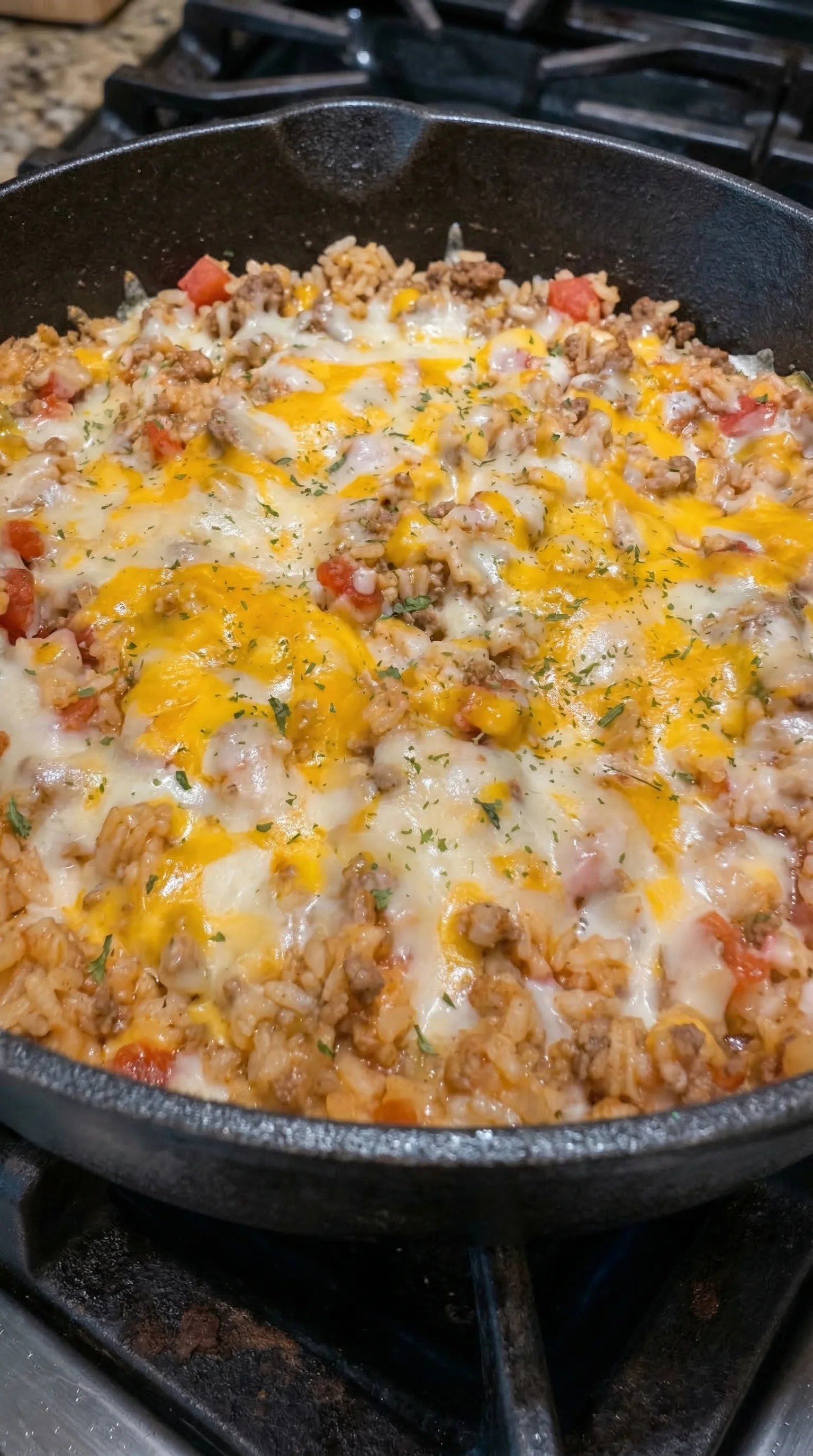 A close up of a delicious cheese and meat casserole.