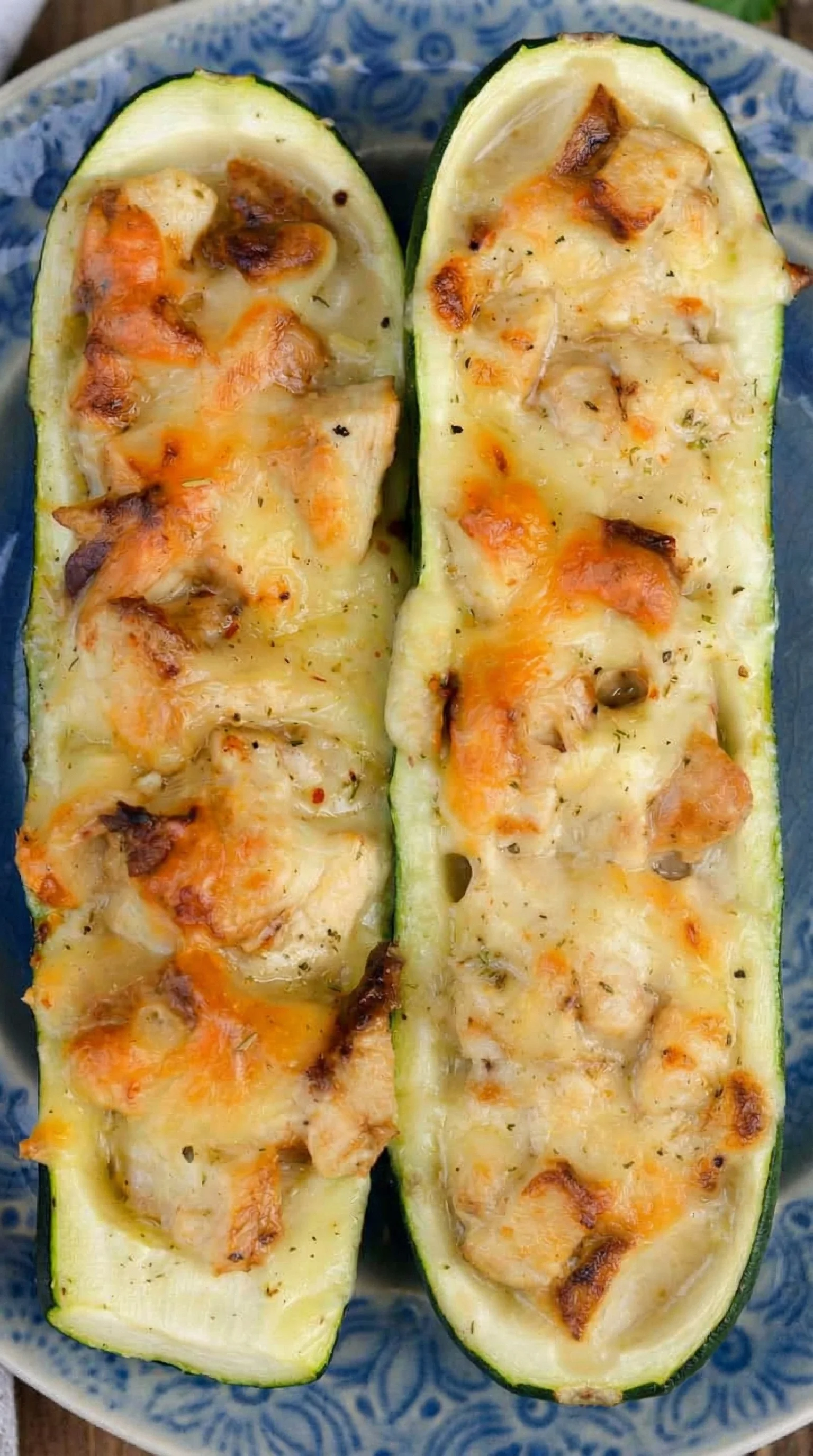 A slice of pizza with cheese and chicken.