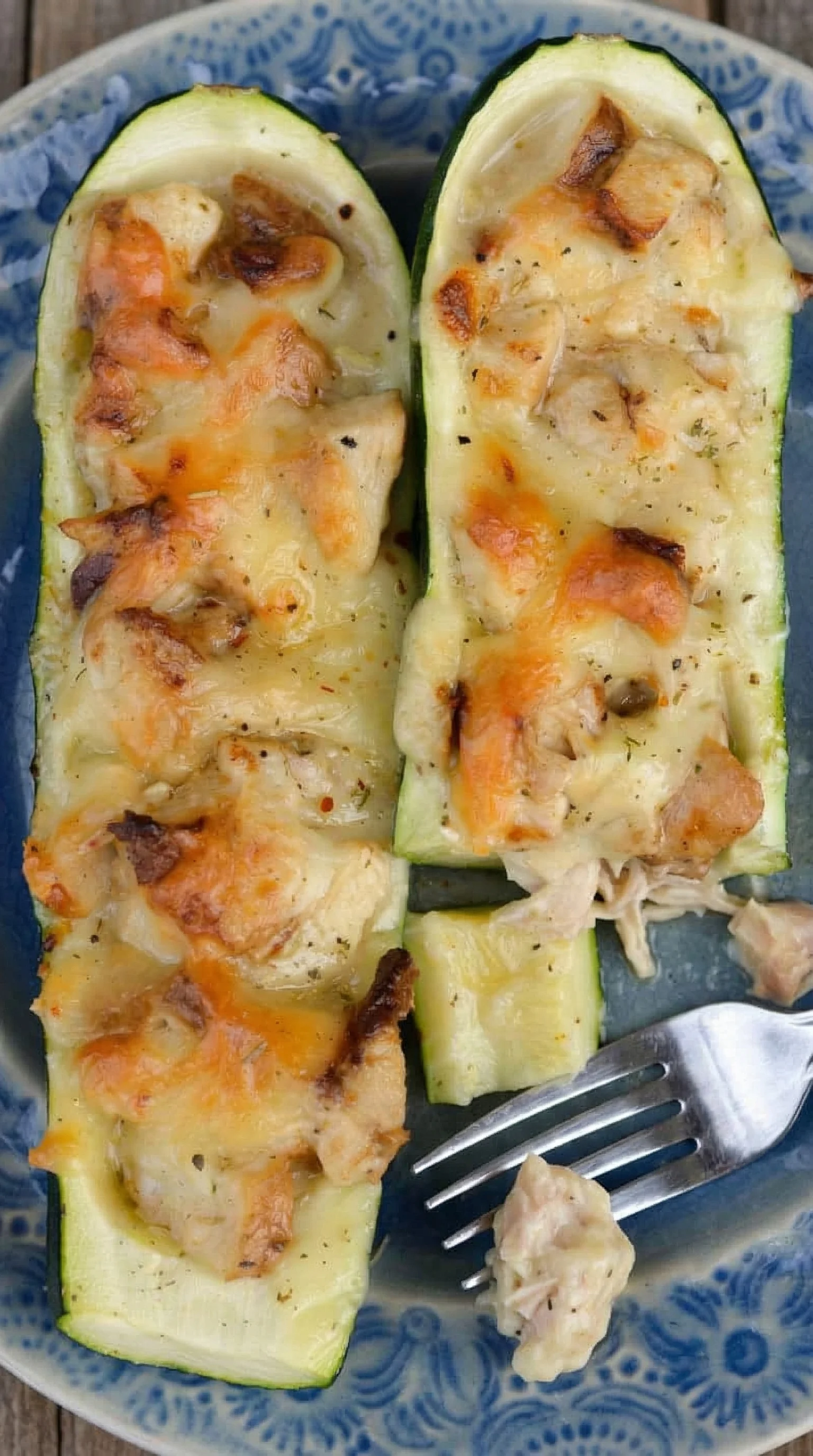 A slice of cheese and chicken pizza.