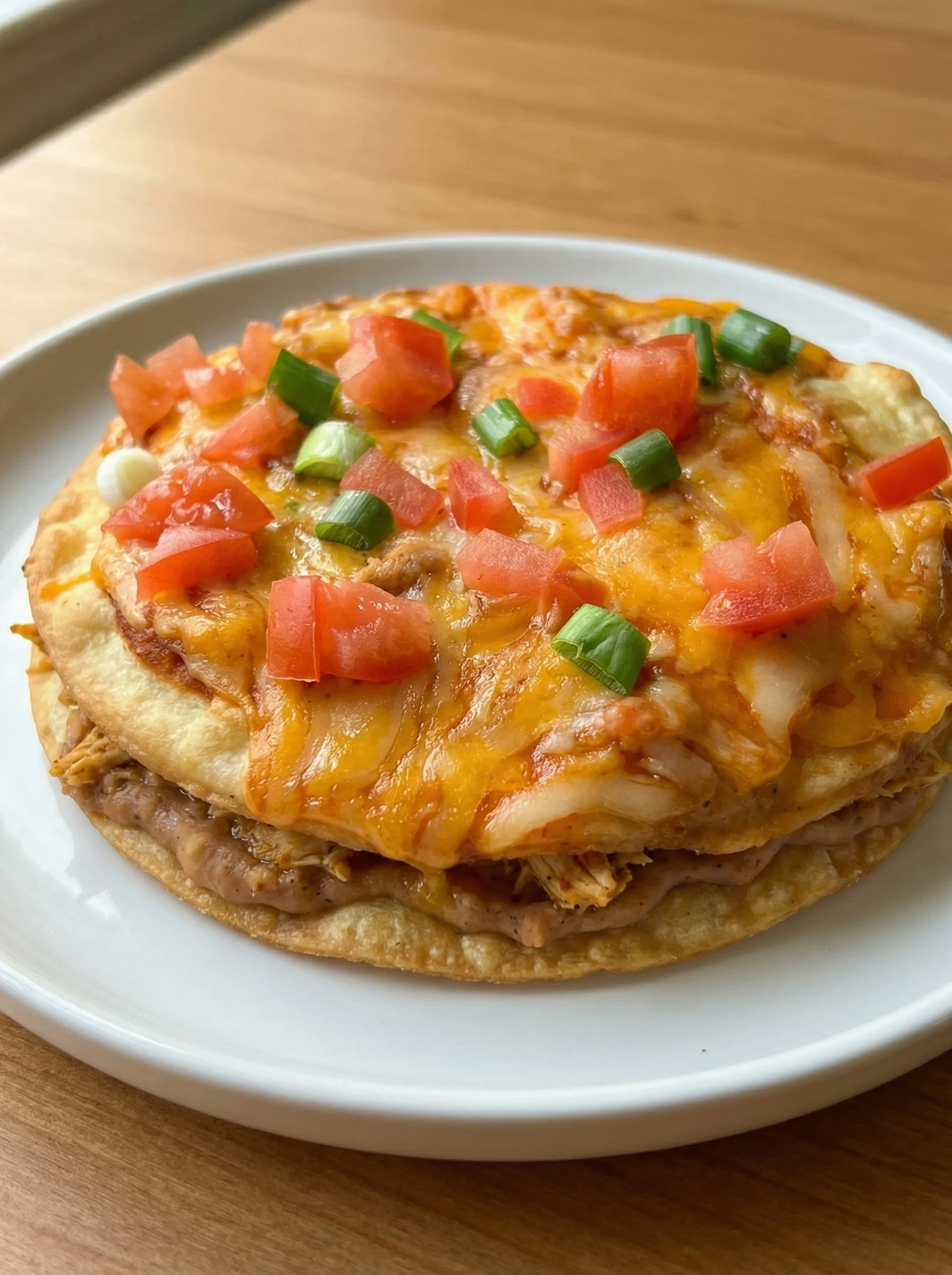 A plate of food with tomatoes and cheese.