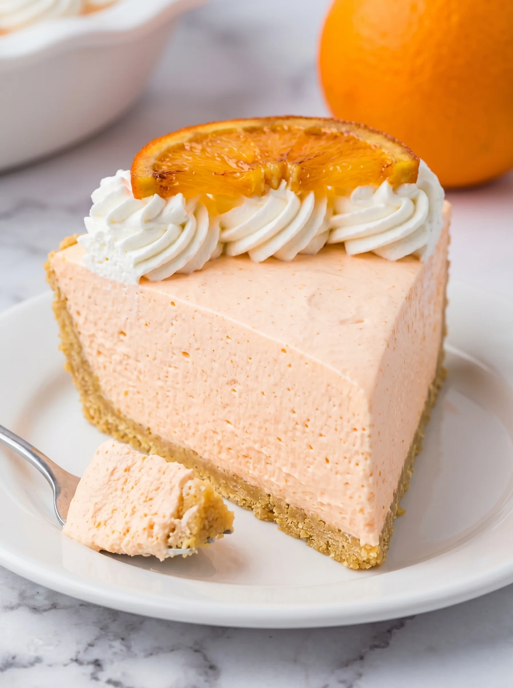 A slice of Jello Creamsicle Pie.