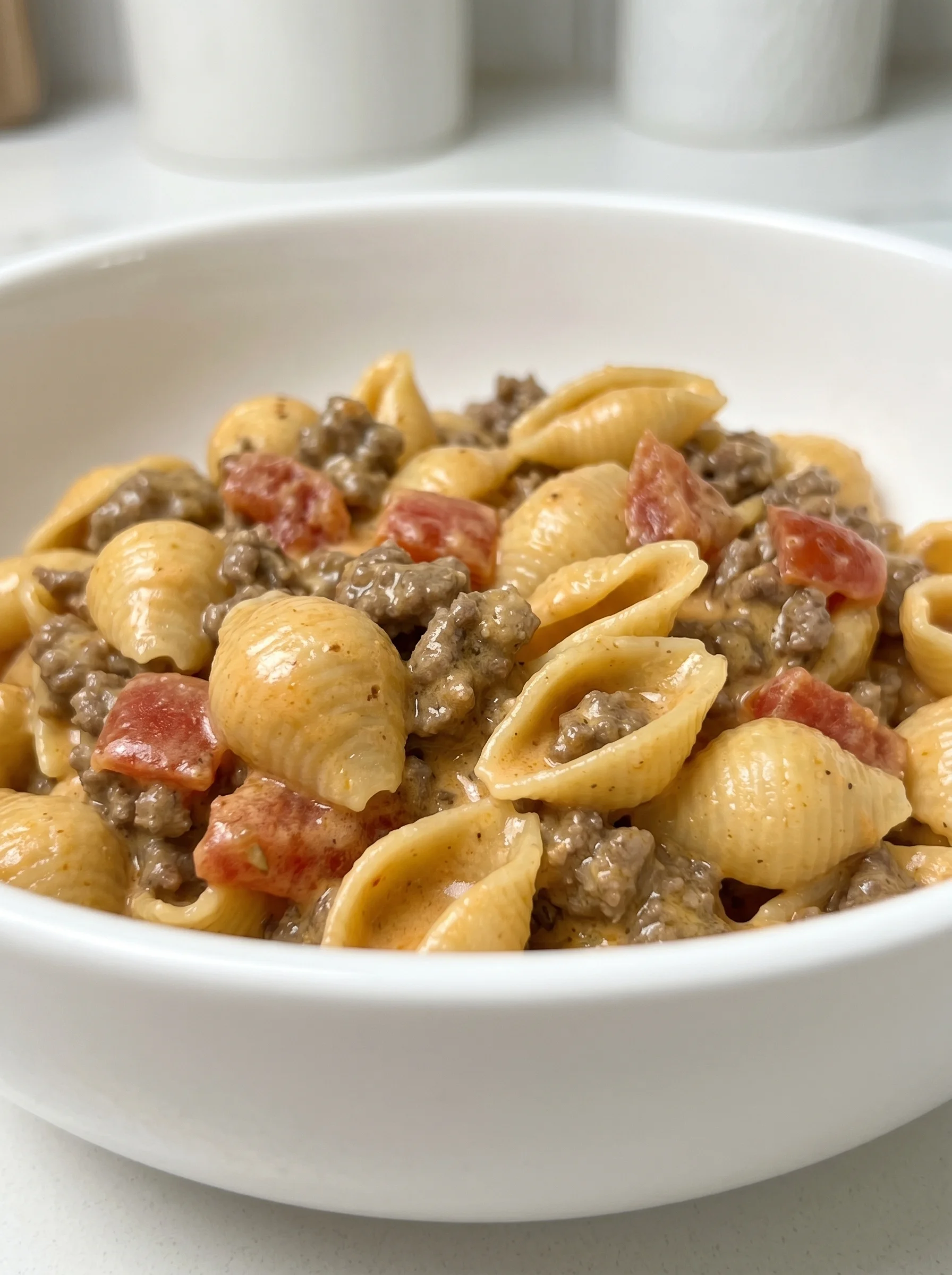 A bowl of creamy pepper jack taco beef and noodles.