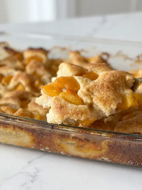 A slice of peach cobbler.