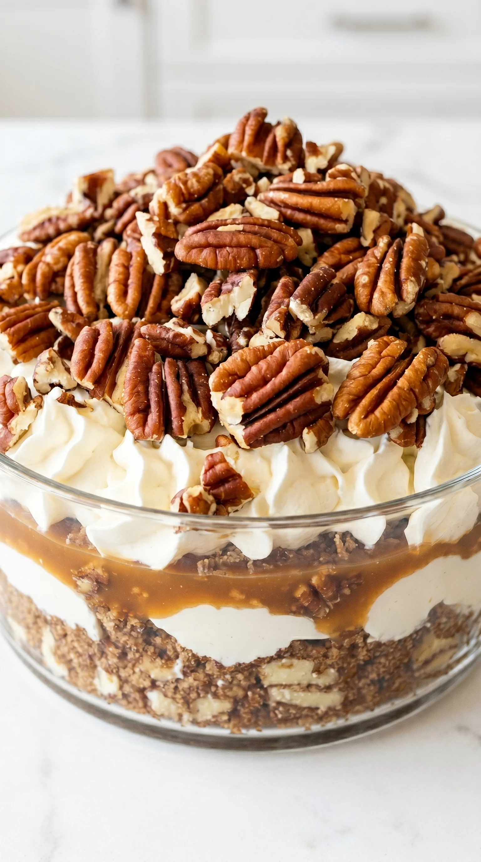 A close up of a pecan pie cheesecake trifle.