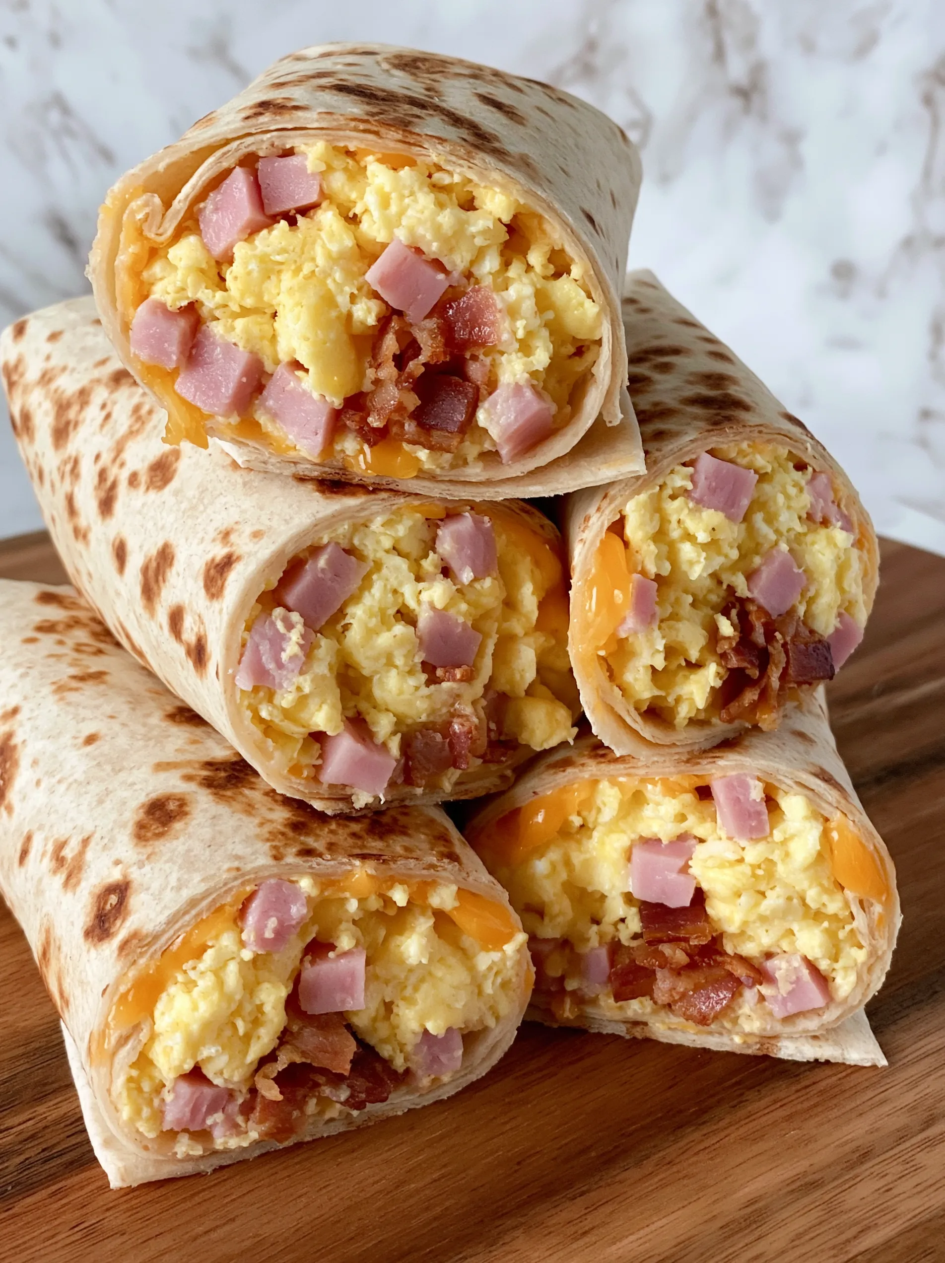 Breakfast burritos with bacon and eggs.