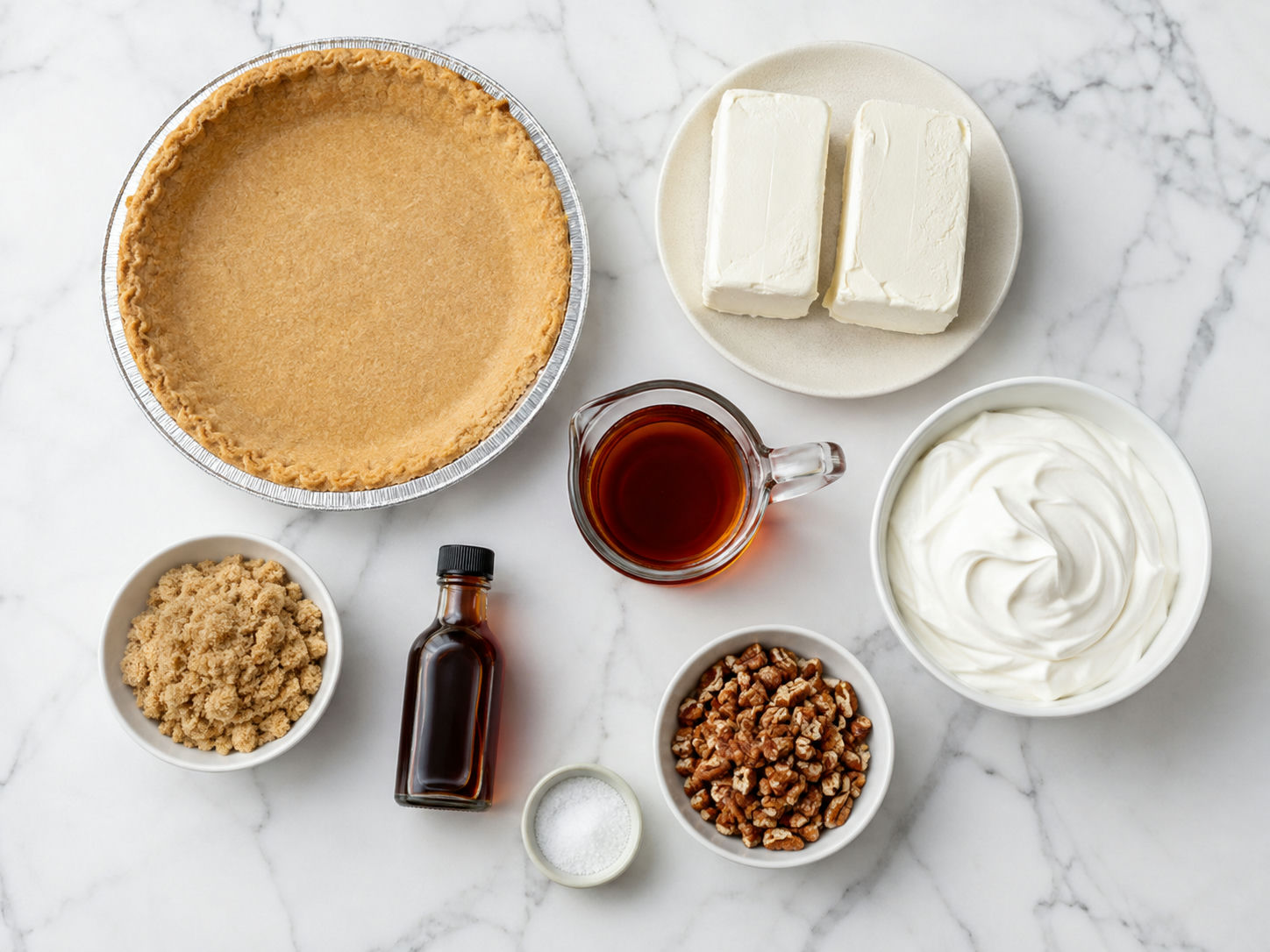 Ingredients for maple pecan cream pie with cream cheese and pecans