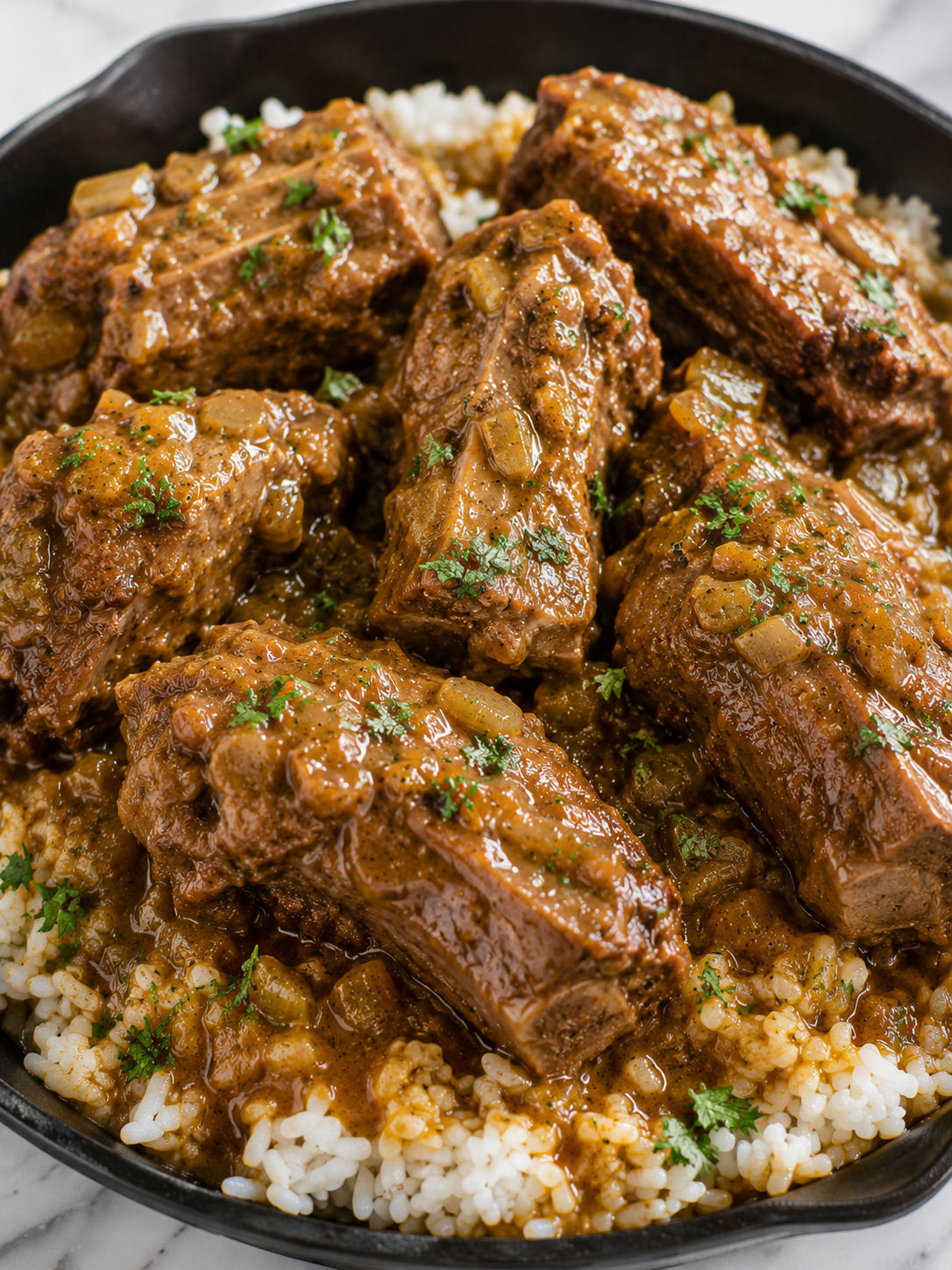 Tender smothered turkey necks over rice with glossy brown gravy