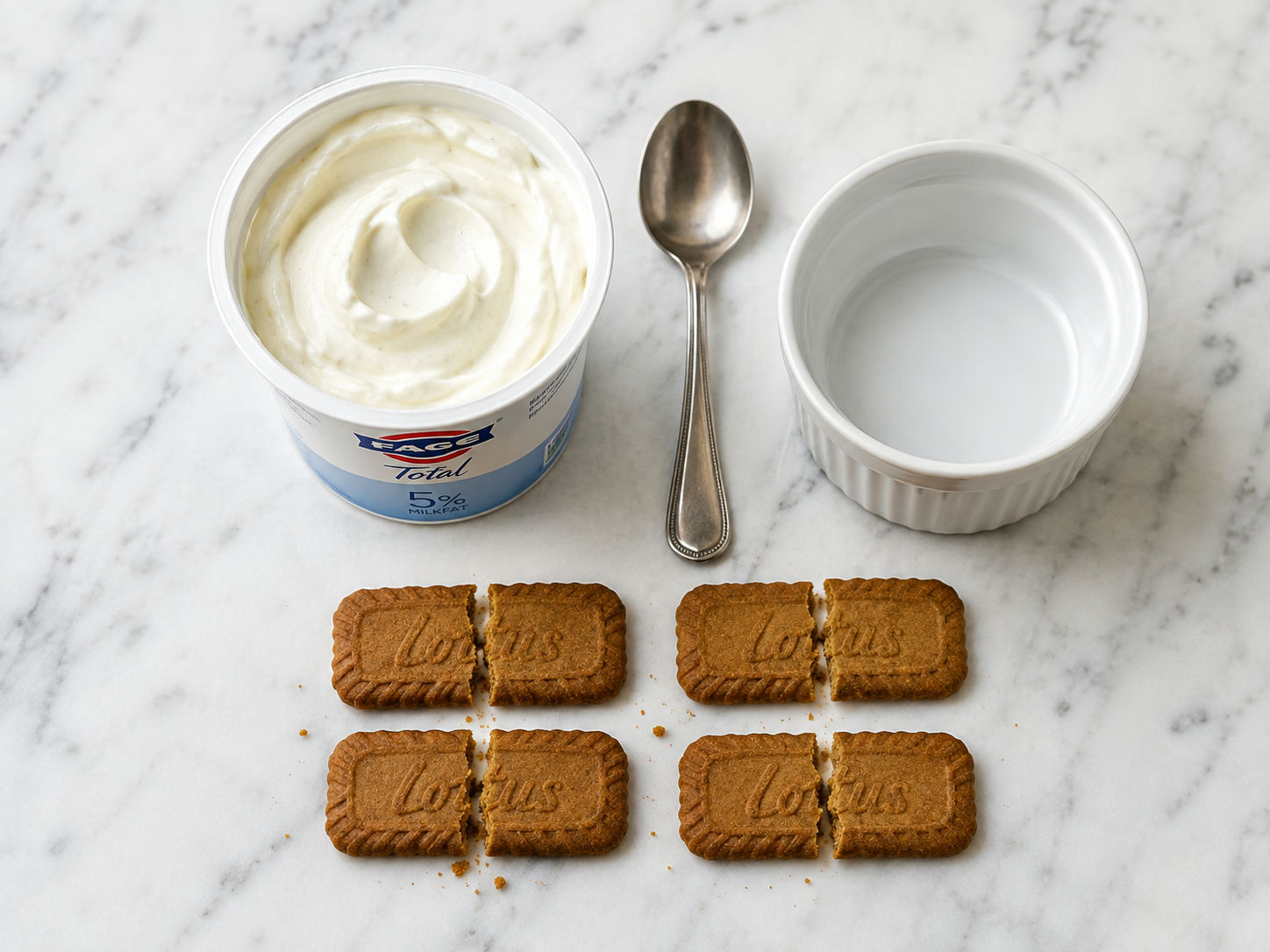 Greek yogurt and Biscoff cookies ready for no-bake cheesecake cups