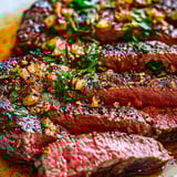 A piece of meat with a lot of seasoning on it.