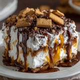 A white plate with a dessert on it.