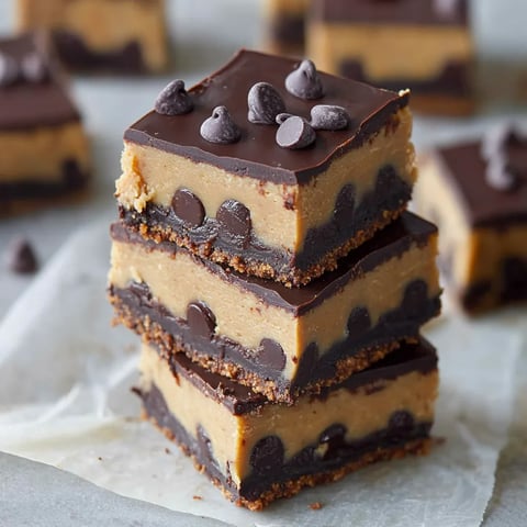 A stack of chocolate and peanut butter bars.